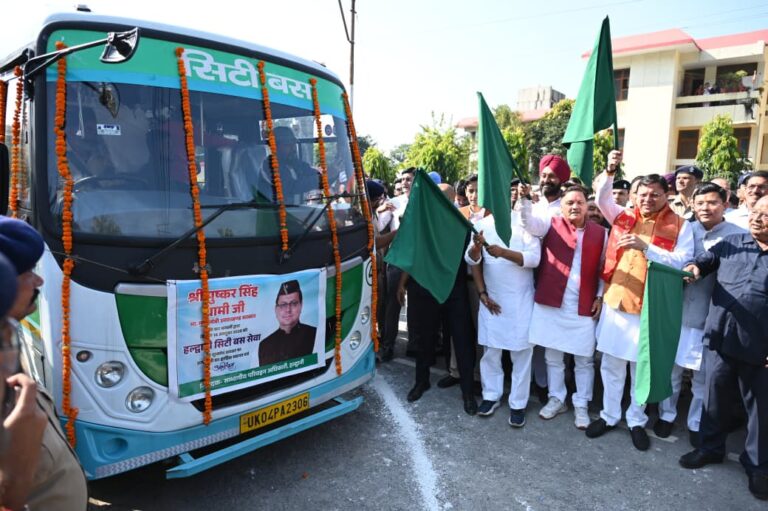 CM Pushkar Singh Dhami launching Haldwani city bus service with green flag