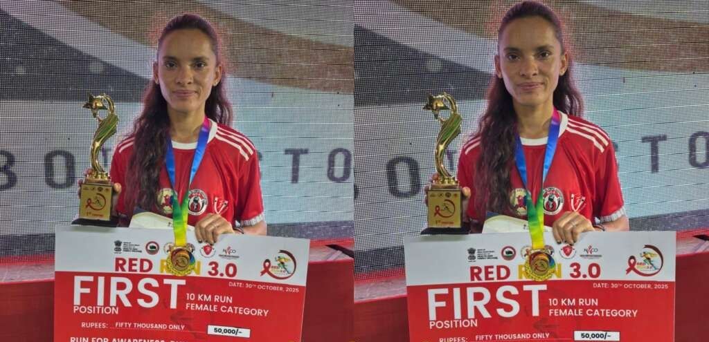 उत्तराखण्ड की अनीशा रेड रन मैराथन 3.0 में स्वर्ण पदक जीतती हुई