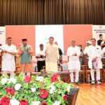 हल्द्वानी में वरिष्ठ नागरिक सम्मान समारोह में बुजुर्गों को सम्मानित करते मुख्यमंत्री पुष्कर सिंह धामी